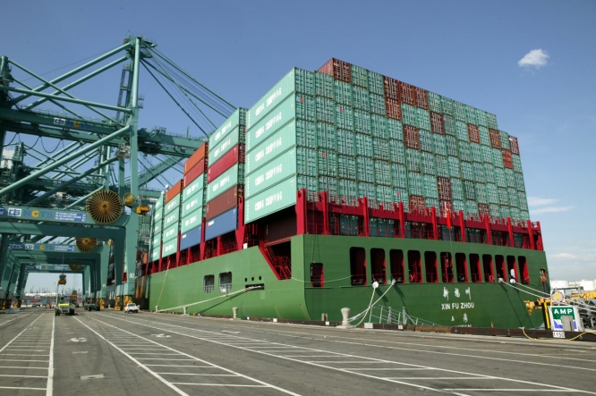 Your wine is here. Someplace. The announcement of a tentative settlement to the nine-month strike affecting 29 West Coast ports may means a return to normal commerce soon. Photo courtesy Port of Los Angeles